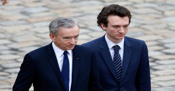 LVMH luxury group Chief Executive Bernard Arnault and his son Frederic Arnault  attend the