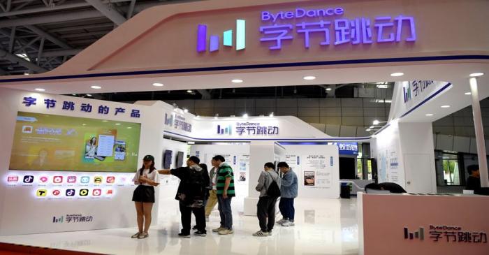 FILE PHOTO: People are seen at the Bytedance Technology booth at the Digital China exhibition