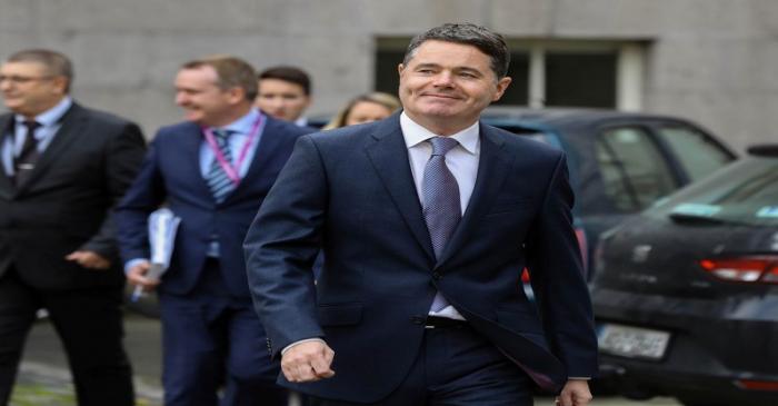 Irish Finance Minister Paschal Donohoe walks outside Government Buildings in Dublin