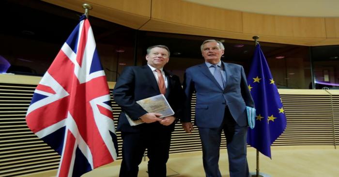 FILE PHOTO: European Union chief Brexit negotiator Michel Barnier and British Prime Minister's