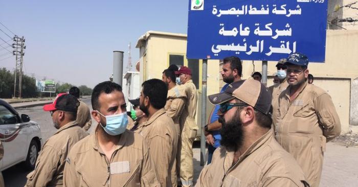 Local worker Muhammad Subeih Haider protests with others in Basra