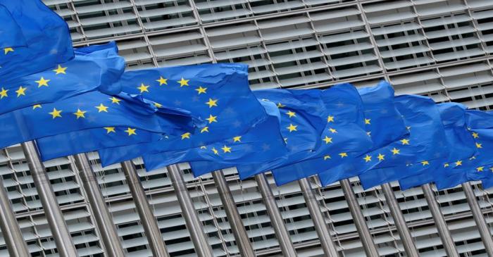 FILE PHOTO: European Union flags flutter outside the European Commission headquarters in