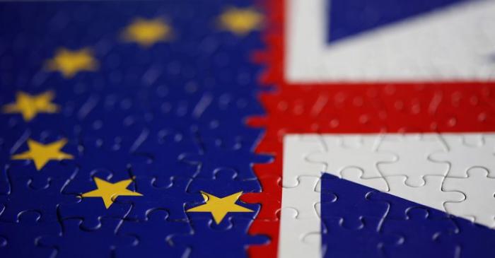 FILE PHOTO: Puzzle with printed EU and UK flags