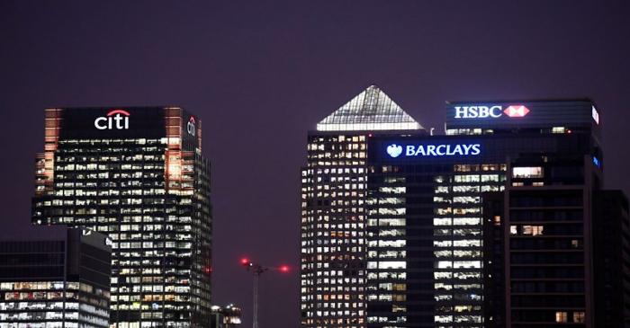 FILE PHOTO: Office blocks of Citi, Barclays, and HSBC banks are seen at dusk in the Canary