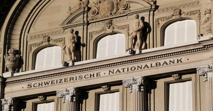 Statues are seen on the building of the Swiss National Bank SNB in Bern