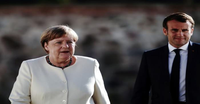 German Chancellor Angela Merkel and French President Emmanuel Macron meet at Meseberg castle