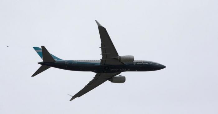 A Boeing 737 MAX airplane takes off on a test flight from Boeing Field in Seattle