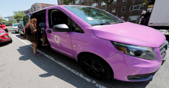 Via ride-sharing van operates in partnership with city-run bus system in Jersey City