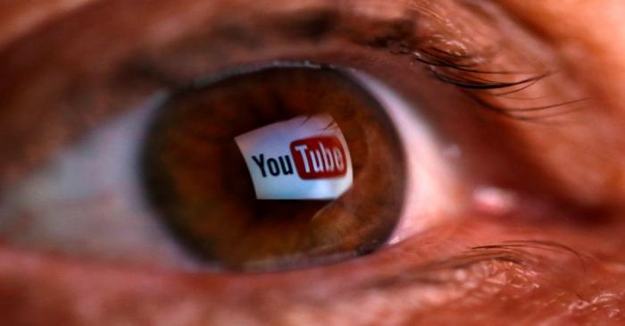 FILE PHOTO: A picture illustration shows a YouTube logo reflected in a person's eye, in central