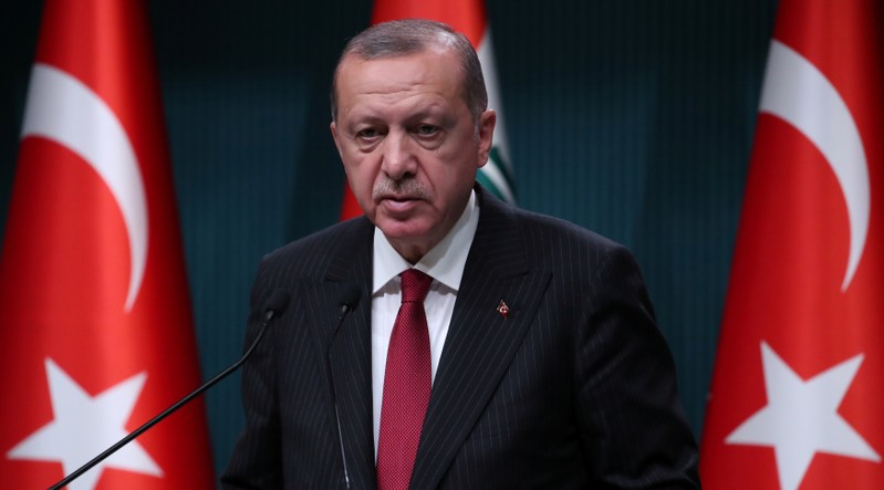 Turkish President Tayyip Erdogan attends a news conference in Ankara