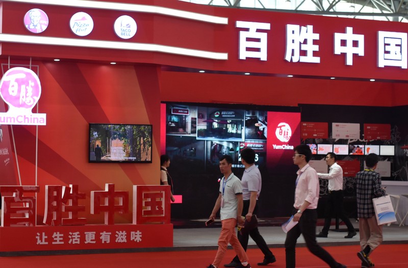 The booth of fast food restaurant company Yum China Holdings Inc. is seen at an investment and