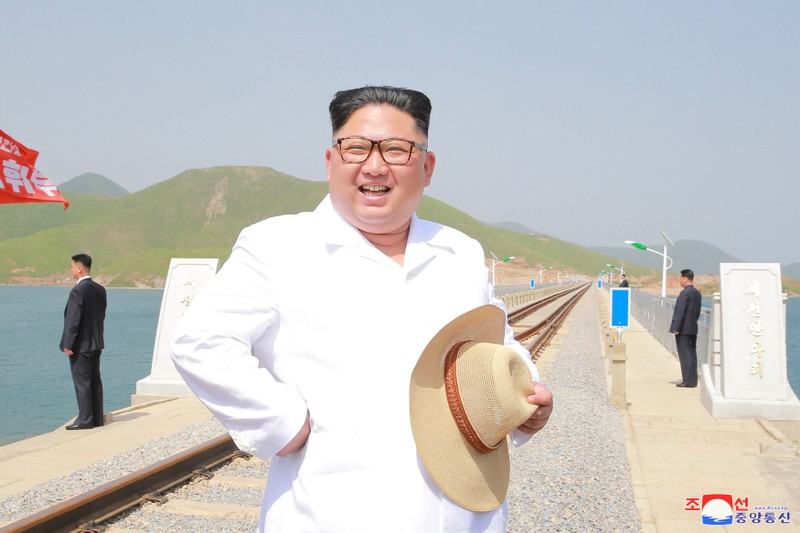 FILE PHOTO: North Korean leader Kim Jong Un inspects the completed railway that connects Koam