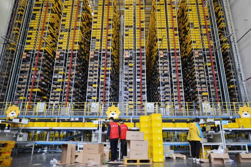 Employees work at a logistics base of Suning ahead of the Singles Day online shopping festival