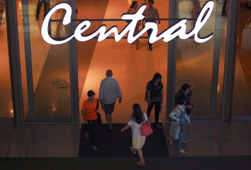 File photo of people walking into a shopping mall in Bangkok