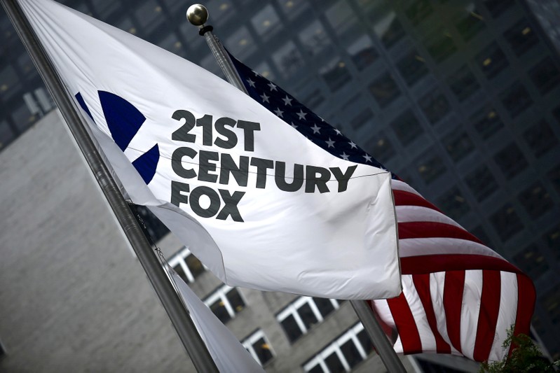 The flag of the Twenty-First Century Fox Inc is seen waving at the company headquarters in the