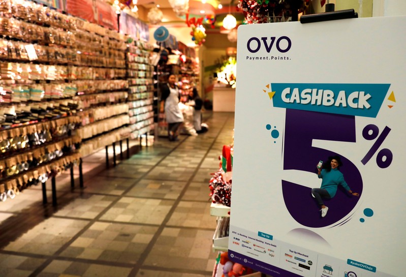 A sign of OVO payment is seen at a mall in Jakarta