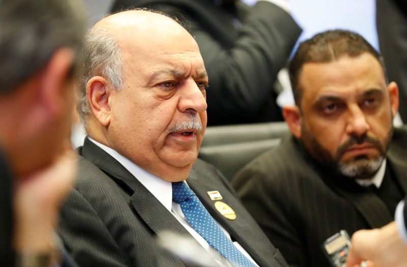 Iraq's Oil Minister Al Ghadhban talks to journalists at the beginning of an OPEC meeting in