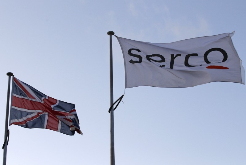 File photograph shows a Serco flag flying alongside a Union flag outside Doncaster Prison in