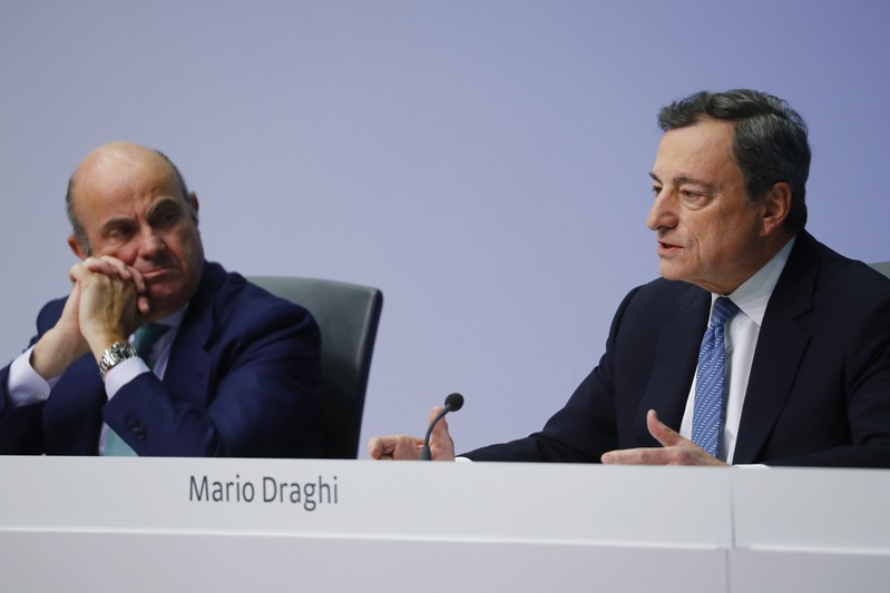 ECB President Draghi and Vice-President de Guindos attend news conference at ECB headquarters