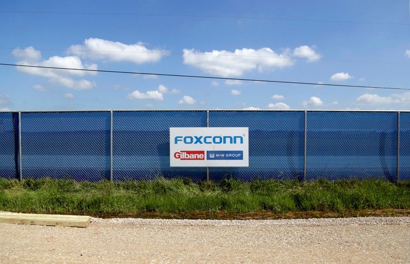 FILE PHOTO: A FoxConn logo is seen before the arrival of U.S. President Donald Trump as he