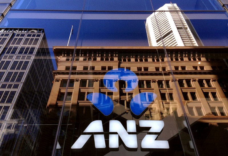 The logo of the ANZ Banking Group is displayed in the window of a newly opened branch in