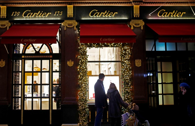FILE PHOTO: Festive lights decorate the Cartier store on New Bond Street as shoppers do
