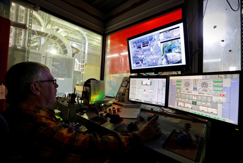 The hoist operator monitors screens at Nevada Copper's Pumpkin Hollow copper mine in Yerington,