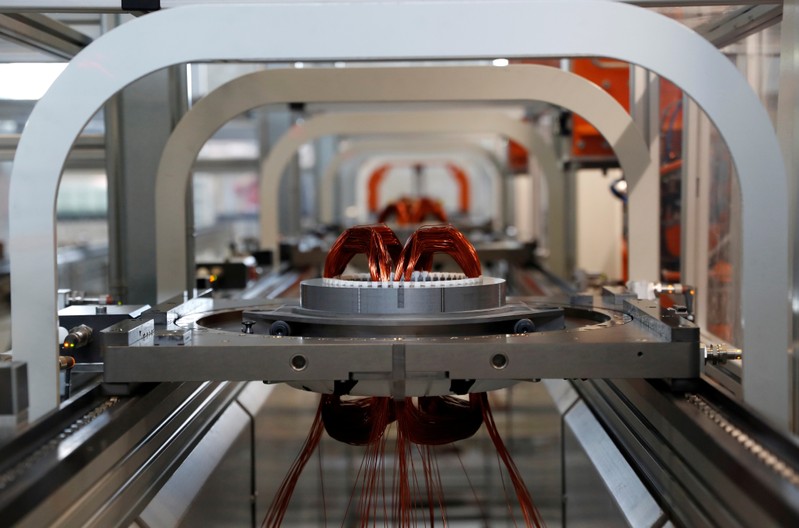 FILE PHOTO: A part of an electric engine is seen on a production line at the Audi Factory in
