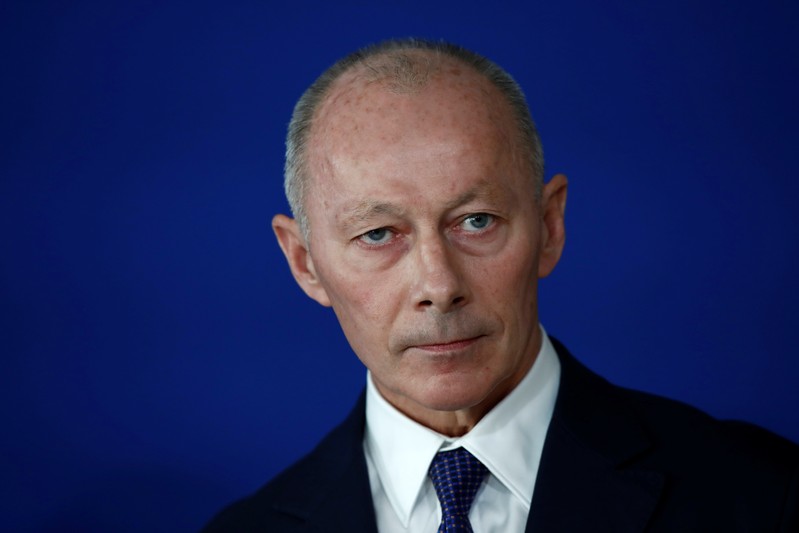Renault's acting deputy chief executive Thierry Bollore attends a news conference about the