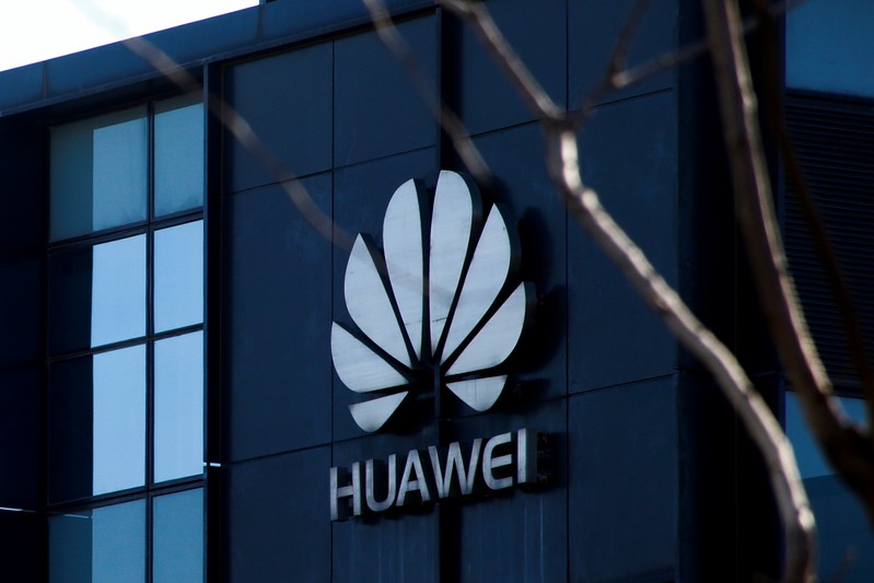 FILE PHOTO: Company logo at the office of Huawei in Beijing