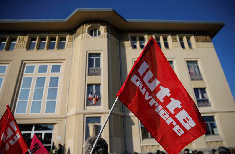 Protesters take part in a demonstration organised by French Trade Union CGT in Belfort