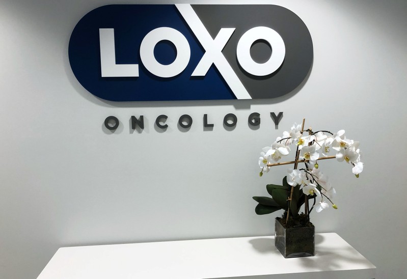 Orchid stands on a table at the entrance to Loxo Oncology headquarters in Stamford
