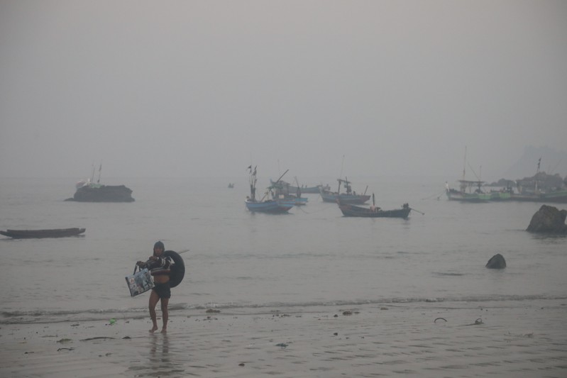 A fisherman return from a morning haul in Ngapali beach in Thandwe