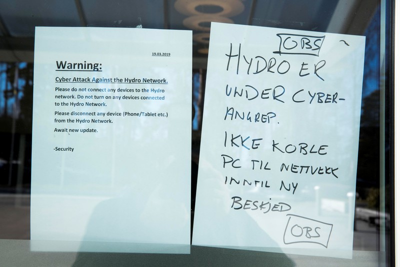A note warning visitors about a cyber attack is seen at the headquarters of aluminum producer