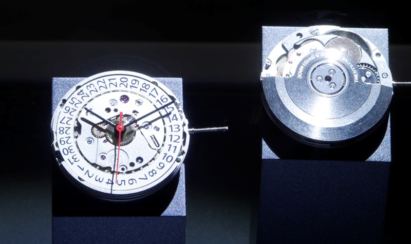 Both sides of a Caliber R150 watch movement of Swiss manufacturer Ronda are seen on display at
