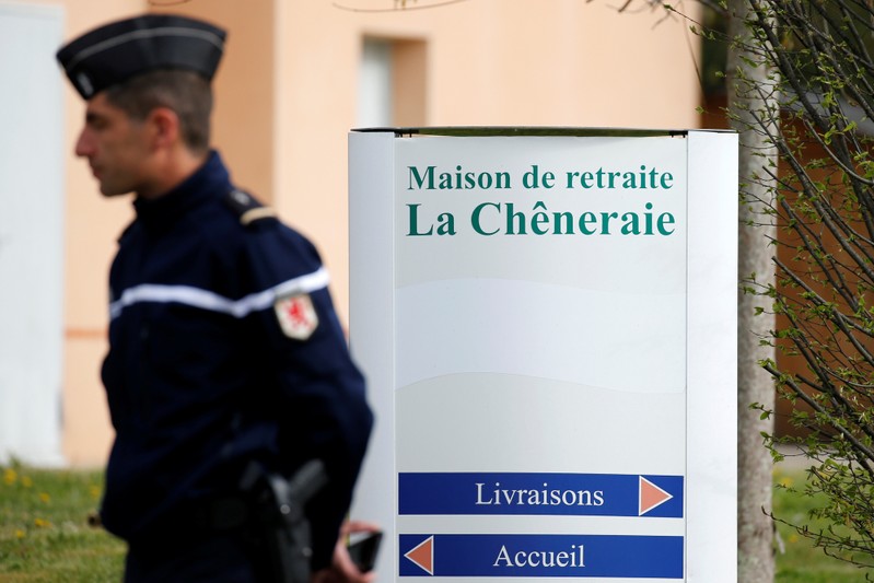 A French gendarme stands at the entrance of the 