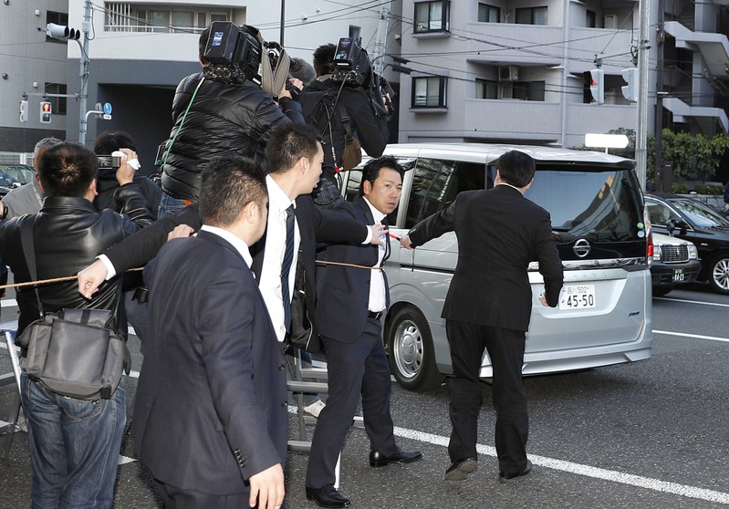 A van believed to be carrying former Nissan Motor Chairman Carlos Ghosn leaves Ghosn's
