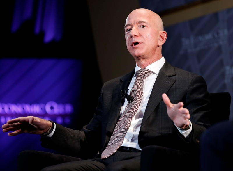 FILE PHOTO: Jeff Bezos, president and CEO of Amazon and owner of The Washington Post, speaks at