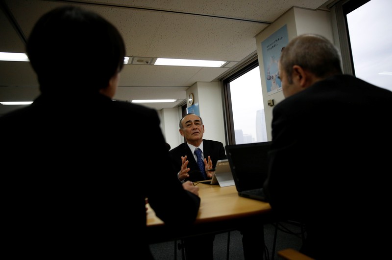 Yasuhiro Furuse, a senior adviser of corporate sales headquarters of Orix Corp., speaks with