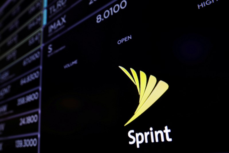 FILE PHOTO: A screen shows a Sprint logo above the floor of the New York Stock Exchange shortly