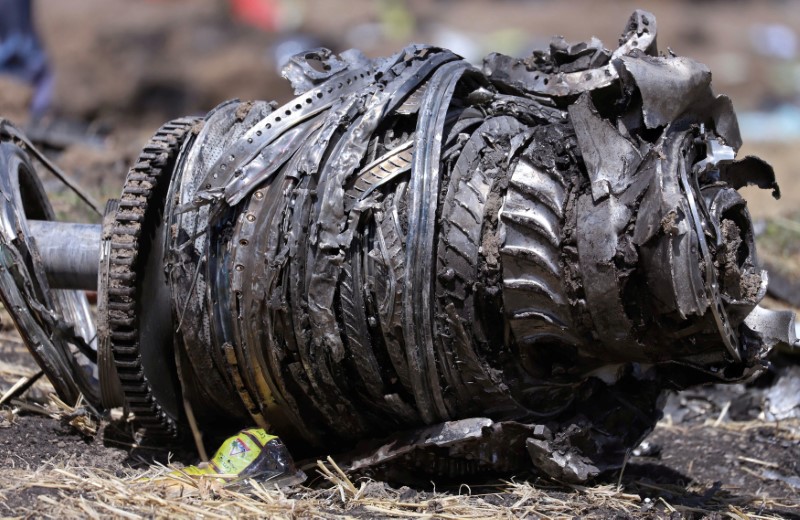 FILE PHOTO: Airplane engine parts are seen at the scene of the Ethiopian Airlines Flight ET 302