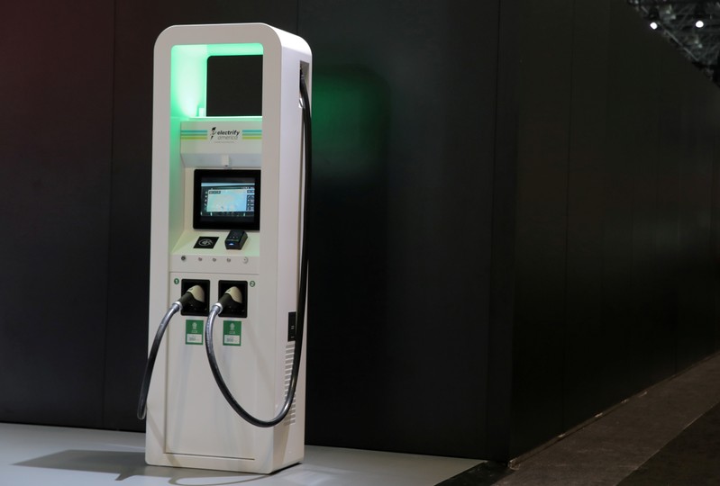 FILE PHOTO: FILE PHOTO: An electric vehicle charging station is seen on display at the 2019 New