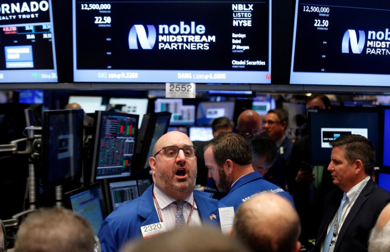 FILE PHOTO: Floor governor Giacchi gives a price for Noble Midstream Partners LP, during the