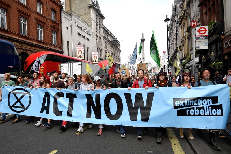 FILE PHOTO: Demonstrators march along Whitehall during an Extinction Rebellion protest in