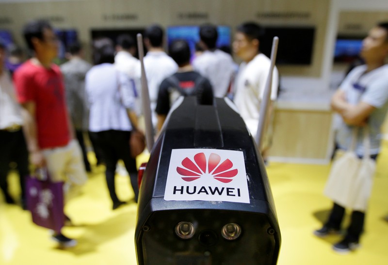 A security robot with Huawei 5G technology is displayed at an exhibition during the World