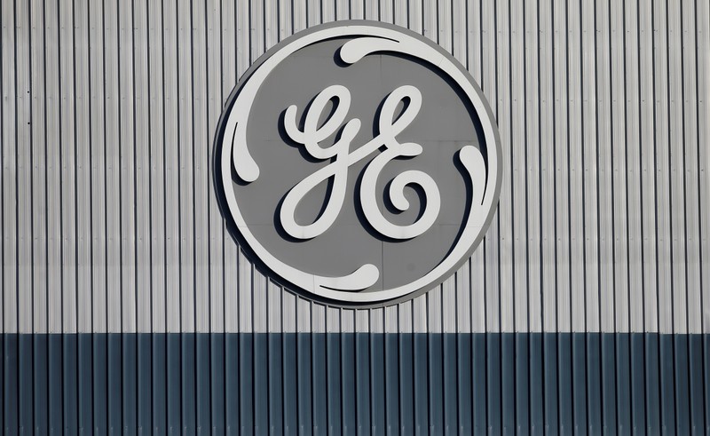 FILE PHOTO: The logo of US conglomerate General Electric is pictured at the company's site of