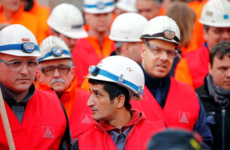 FILE PHOTO: Workers of German steel maker ThyssenKrupp AG protest in a warning strike organised