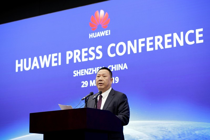 Huawei's Chief Legal Officer Song Liuping attends a news conference on Huawei’s ongoing legal