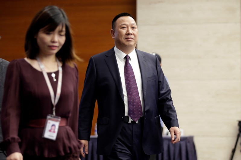 Huawei's Chief Legal Officer Song Liuping arrives for a news conference on Huawei’s ongoing