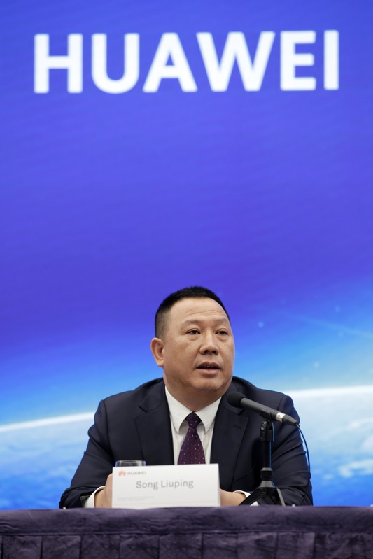 Huawei's Chief Legal Officer Song Liuping attends a news conference on Huawei’s ongoing legal